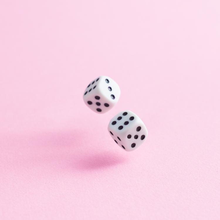  dice with pink background 