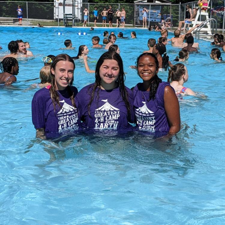  3 Students in the pool at 4-H camp 